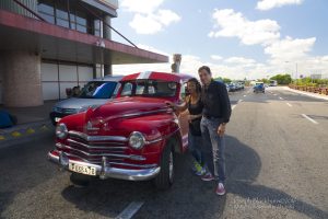 We actually ended up arranging our own ride to the airport. Joseph saw this well restored Plymouth on the street and we got the driver to drive us and take our picture! 